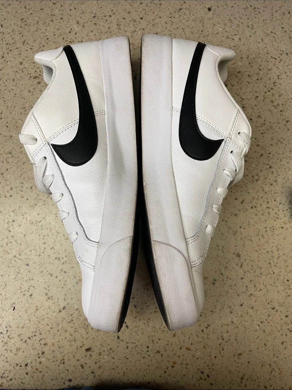 Nike White Leather Low-Top Sneakers with Black Swoosh